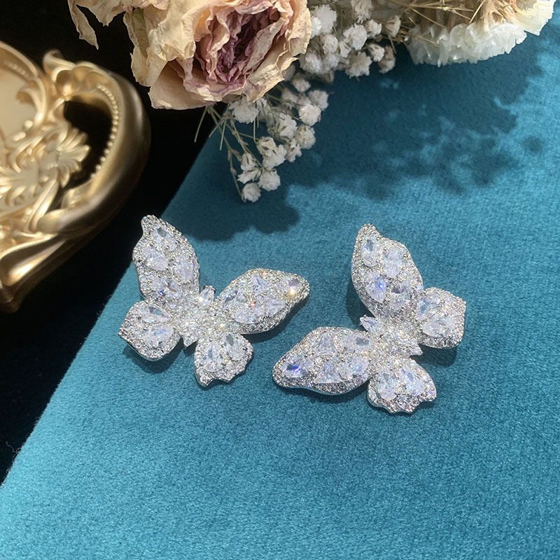 Fashion White Butterfly Copper Zircon Earrings Wholesale