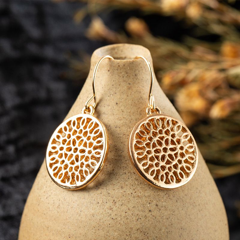 Fashion Round Hollow Carved Flower Alloy Earrings