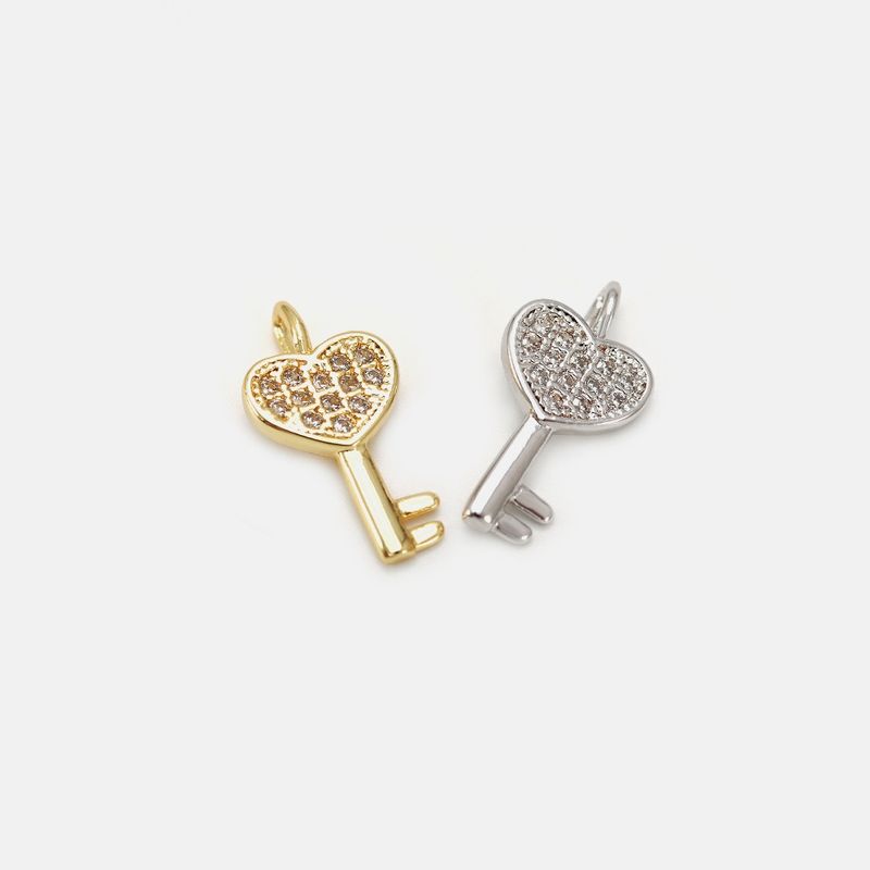 Fashion Heart-shaped Key Copper Inlaid Zircon Earrings Wholesale