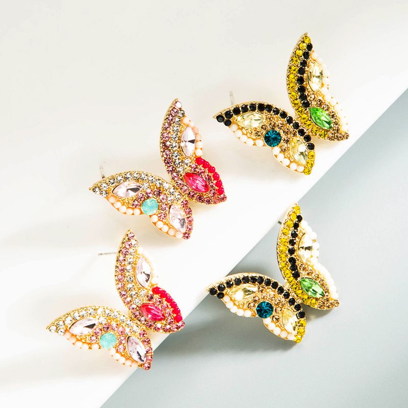 Wholesale Joyería Coreana Tridimensional Mariposa Incrustaciones De Color Pendientes De Diamantes De Imitación Nihaojewelry