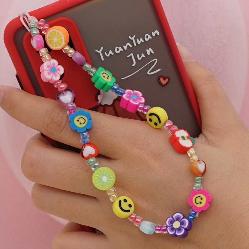 Simple Ethnic Smiling Face Woven Beaded Mobile Phone Chain