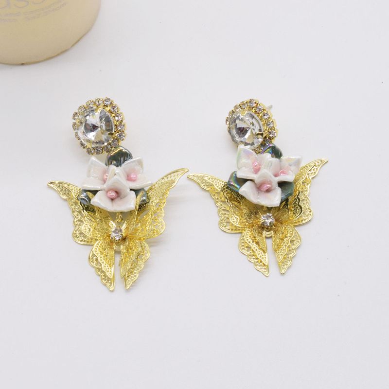 Retro Metal Hollow Butterfly Diamond Flower Earrings