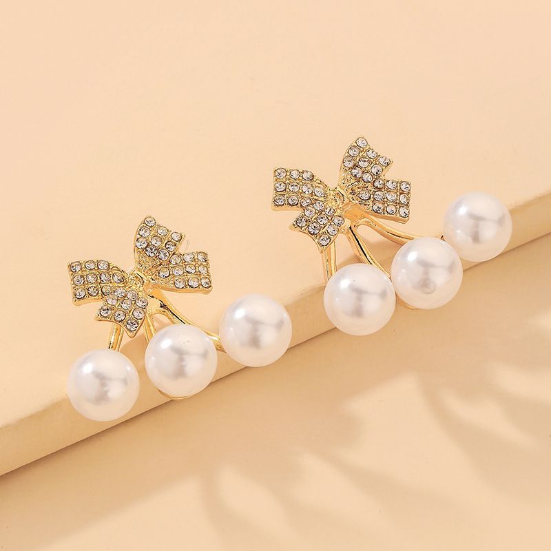 Nihaojewelry Korean Style Perle Strass Bogen Ohrringe Großhandel Schmuck