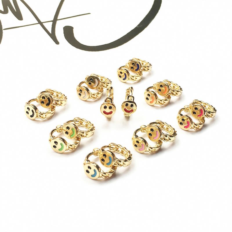 Nihaojewelry Fashion Gold-plated Smiling Face Dripping Oil Earrings Wholesale Jewelry
