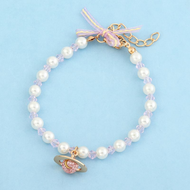 Nihaojewelry Großhandel Schmuck Einfache Natürliche Perle Rosa Saturn Diamantarmband