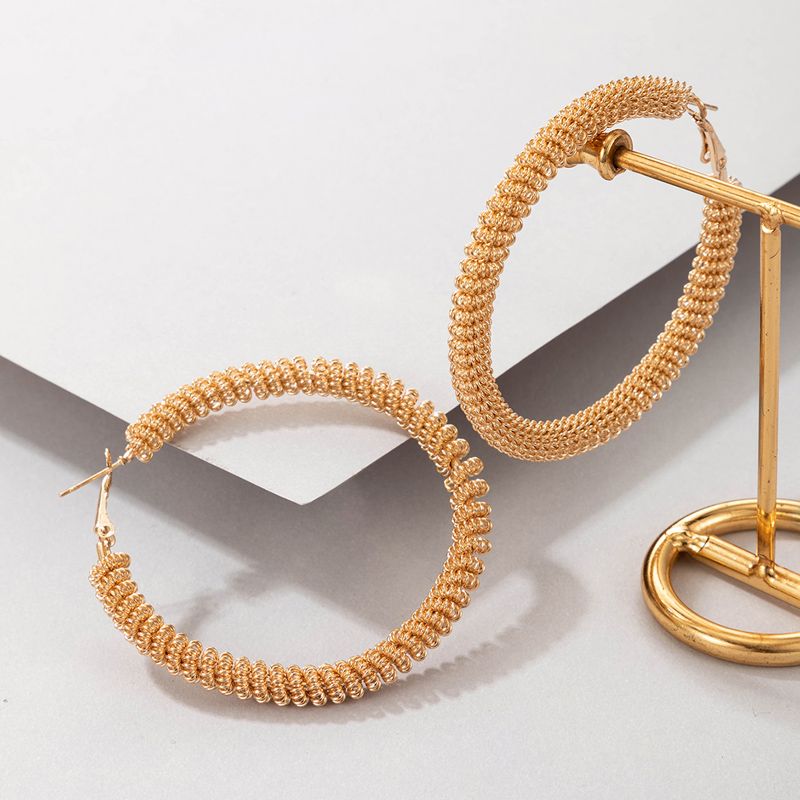 Wholesale Jewelry Retro Golden Winding Circle C-shaped Earrings Nihaojewelry