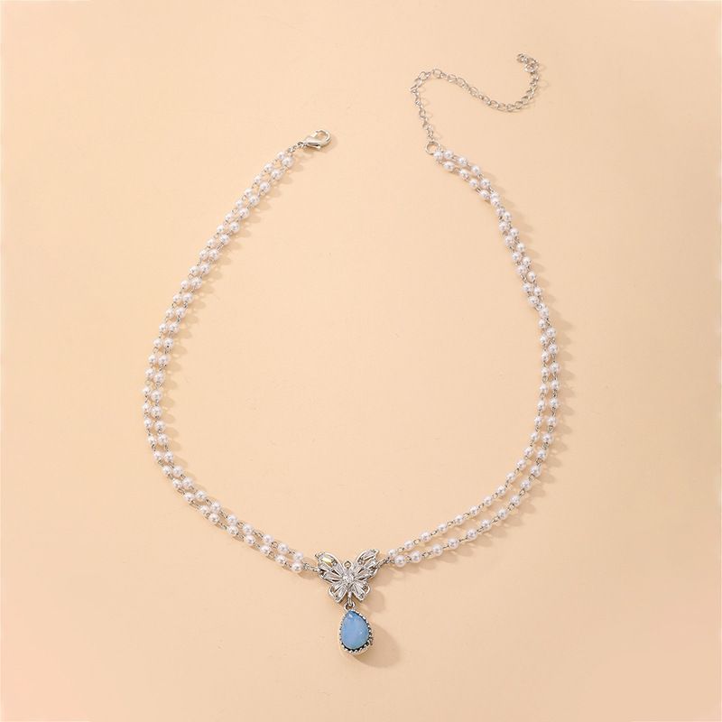 Wholesale Jewelry Double-layer Pearl Butterfly Blue Water Drop Pendant Necklace Nihaojewelry