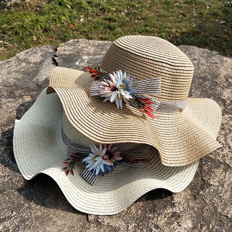 Nihaojewelry Flower Decor Wavy Big Brim Sunscreen Straw Hat Wholesale