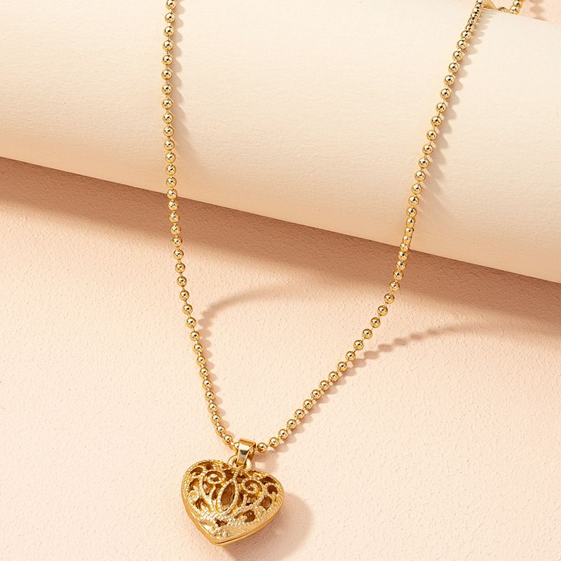 Wholesale Jewelry Hollow Heart Pendant Necklace Nihaojewelry