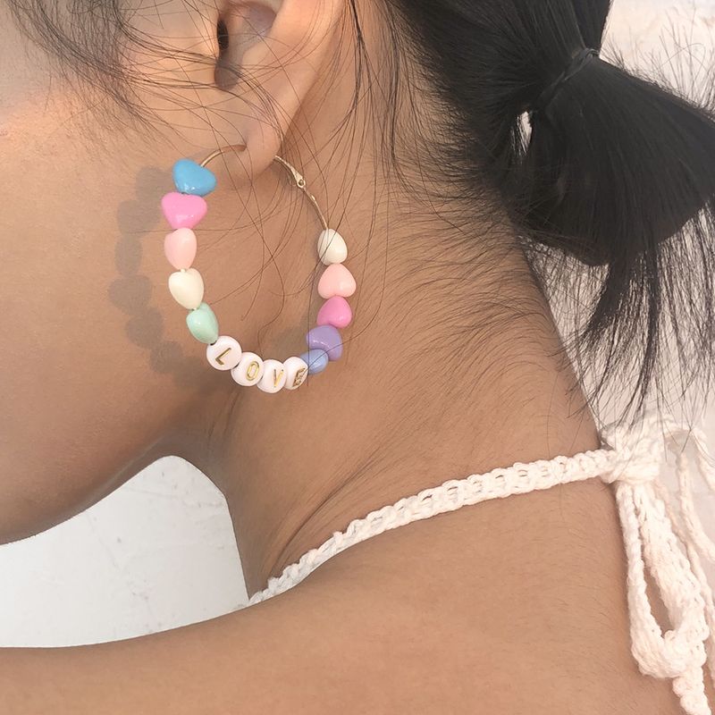 Großhandel Schmuck Einfache Farbe Kreis Legierung Harz Ohrringe Nihaojewelry