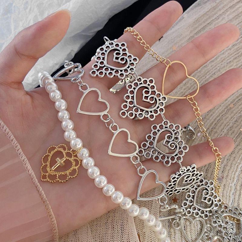 Wholesale Jewelry Hollow Heart Splicing Pendant Necklace Nihaojewelry