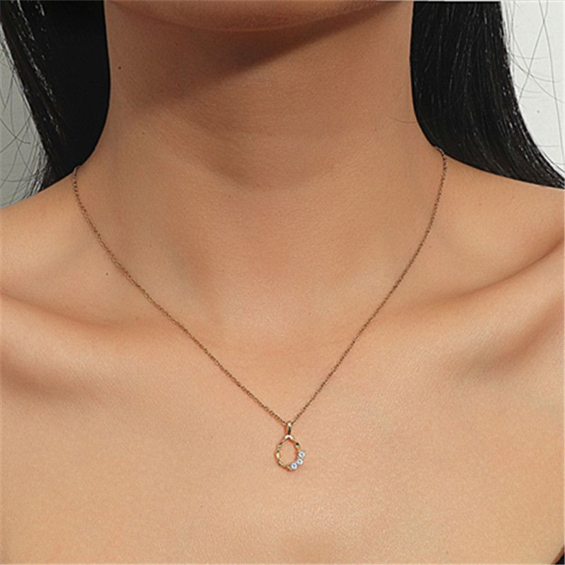 Wholesale Jewelry Simple Hollow Oval Diamond Pendant Titanium Steel Necklace Nihaojewelry