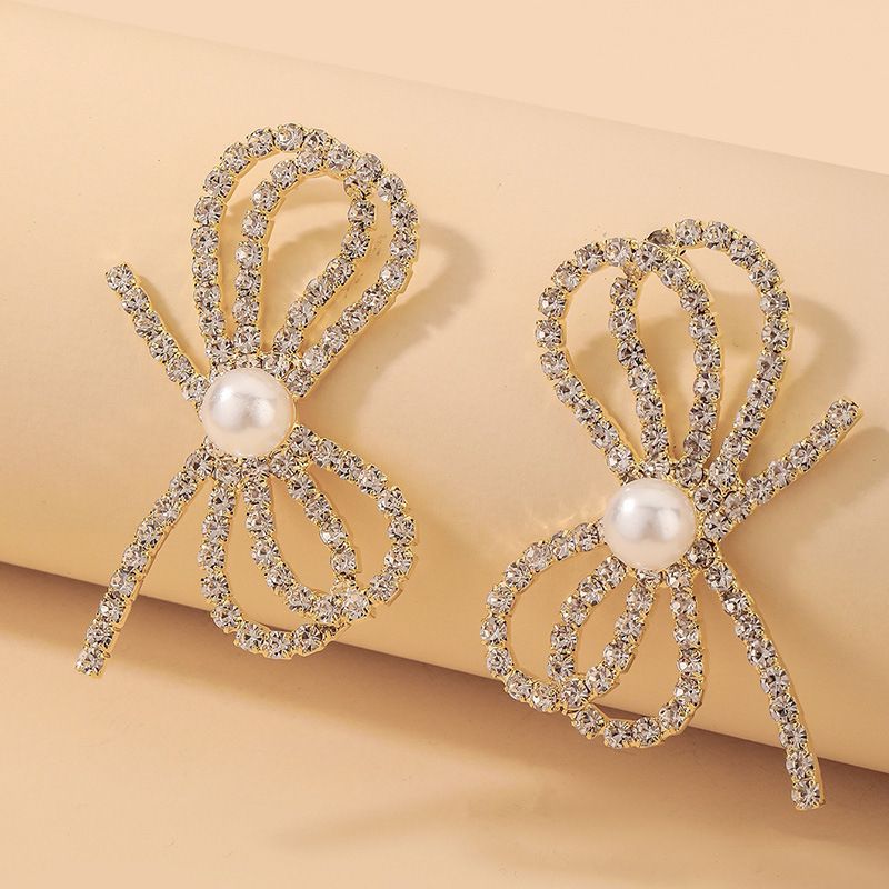 Wholesale Fashion Inlaid Rhinestone Pearl Bow Earrings Nihaojewelry