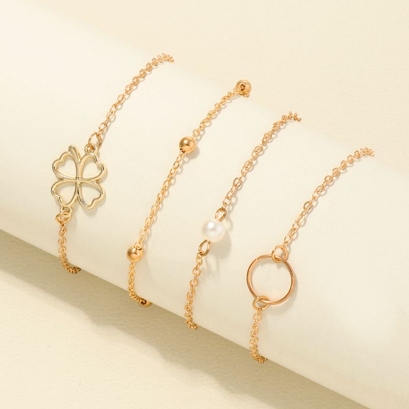 Nihaojewelry Mode Perles De Riz Bague Trèfle À Quatre Feuilles Bracelet Pour Enfants À 4 Couches Bijoux En Gros