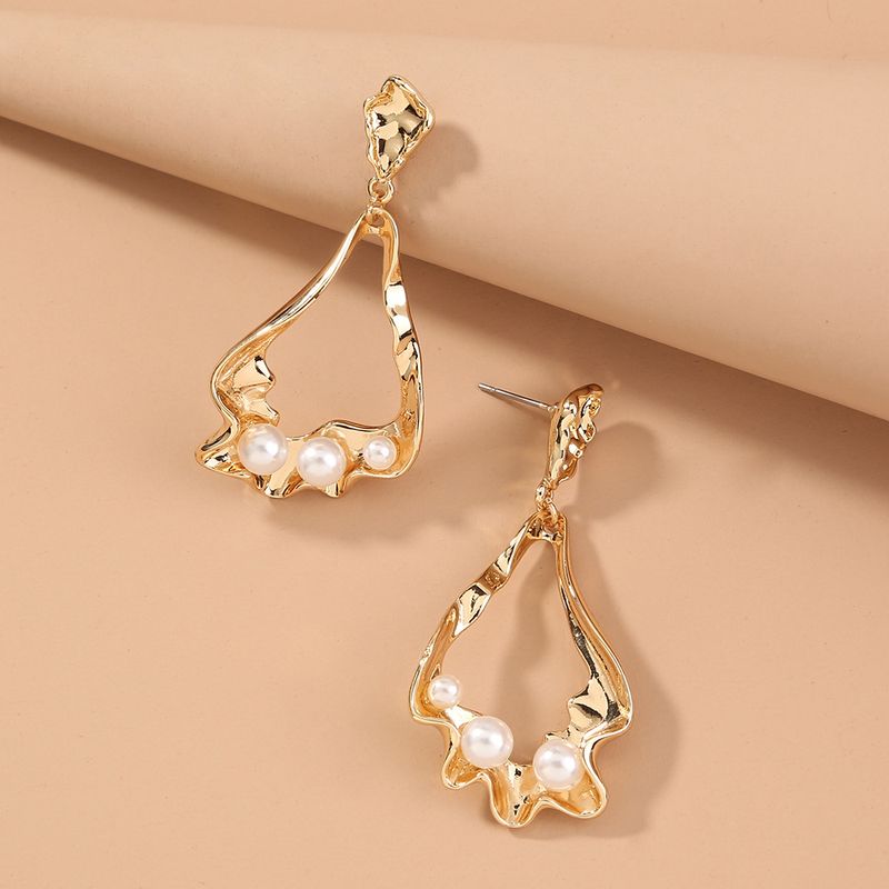 Nihaojewelry Bijoux En Gros Mode Boucles D&#39;oreilles En Perles Incurvées En Métal Creux