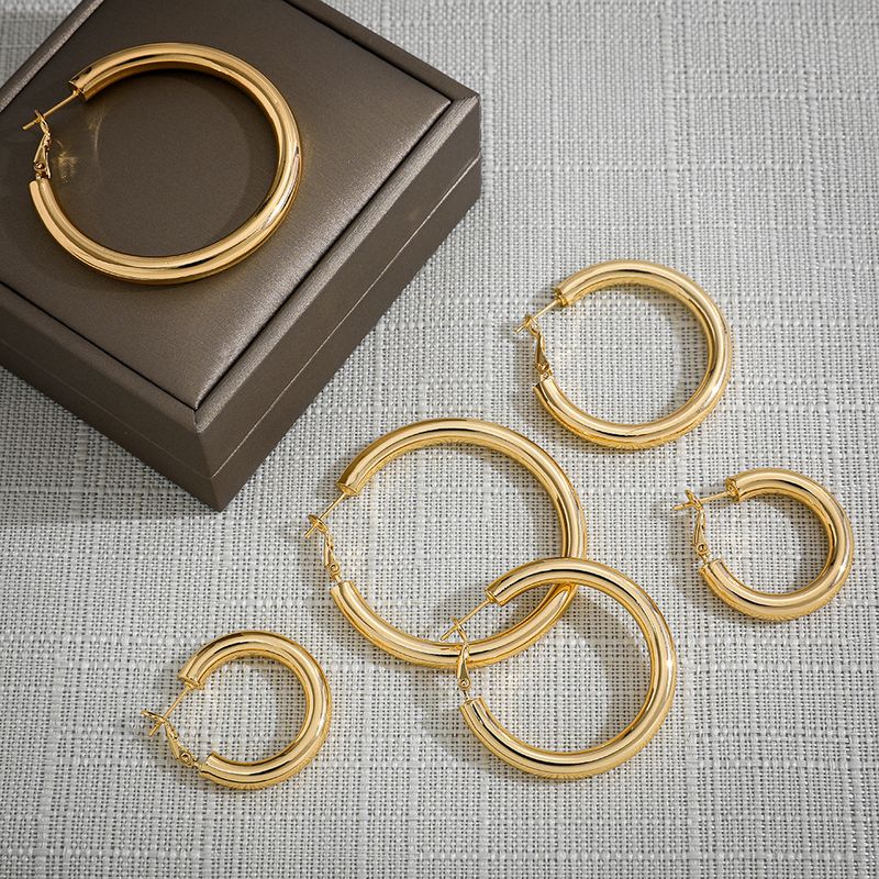 Bijoux Nihaojewelry En Gros Nouvelles Boucles D&#39;oreilles Rondes Dorées Simples En Alliage
