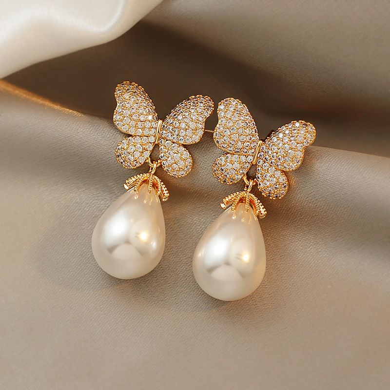 Nihaojewelry Fashion Pearl Diamond Butterfly Earrings Wholesale Jewelry