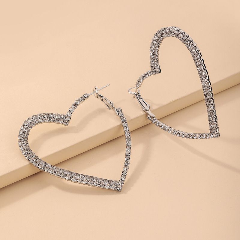 Nihaojewelry Fashion Hollow Heart-shaped Rhinestone Earrings Wholesale Jewelry