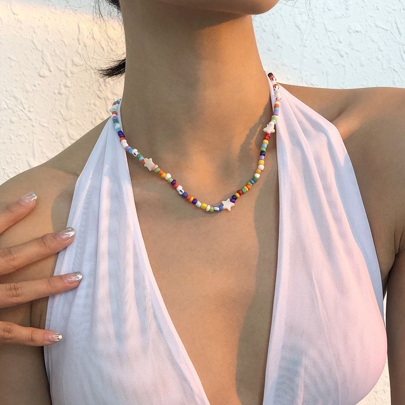Großhandel Mode Farbe Stern Reisperlen Halskette Nihaojewelry