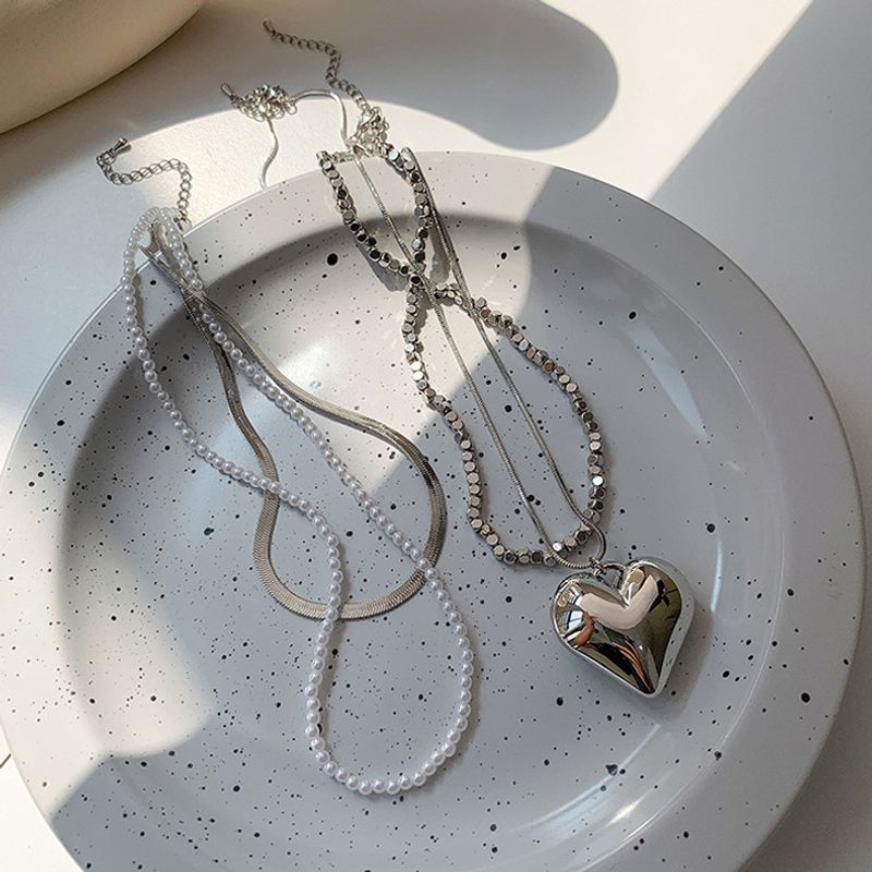 Einfaches Herz Spleißen Perle Schlangenknochen Gestapelte Kupferhalskette Großhandel Nihaojewelry