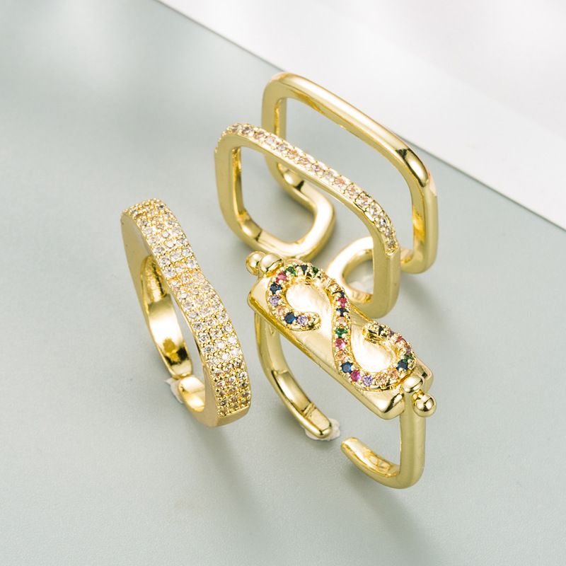 Mode Geometrisches Kupfer Vergoldet Mikroeingelegter Zirkon Kreativer Paarring Großhandel Nihaojewelry
