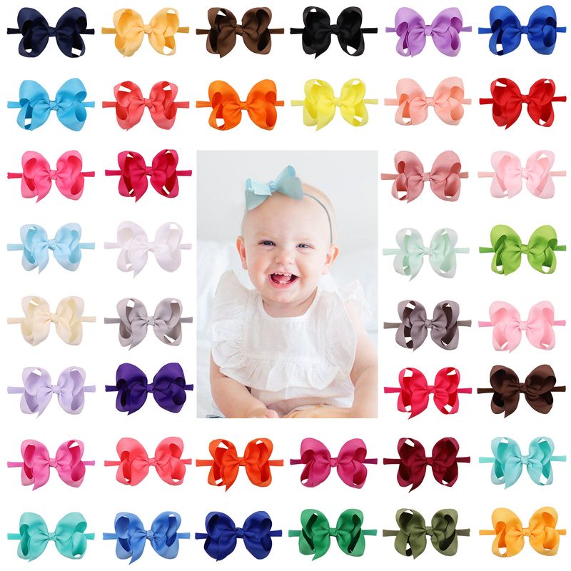 Mode Kinder Bowknot Süßigkeiten Farbe Blase Blume Stirnband Großhandel Nihaojewelry