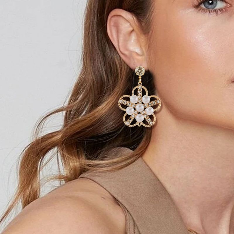 Retro Alloy Flower Hollow Inlaid Pearl Earrings Wholesale Nihaojewelry