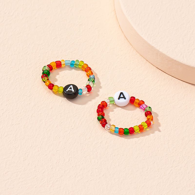 Conjunto De Anillos De Perlas De Color De Letra De Moda Coreana Al Por Mayor Nihaojewelry