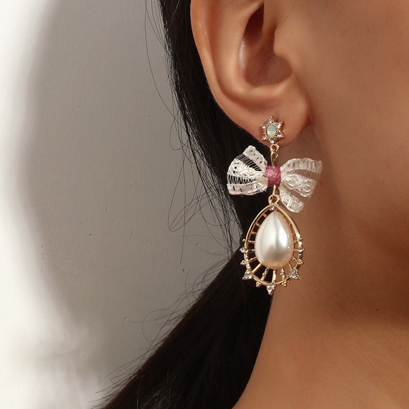 Vintage Mode Perle Wassertropfen Hohle Lange Eingelegte Strass Ohrringe Großhandel Nihaojewelry