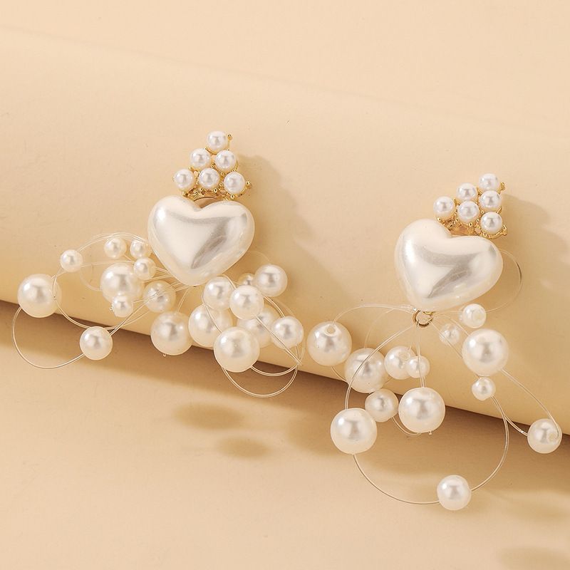 Boucles D&#39;oreilles Ligne De Poisson Coeur Perle Baroque En Gros Nihaojewelry