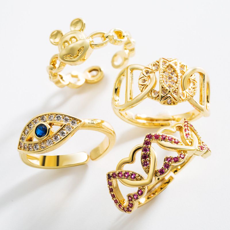 Mode Kreative Persönlichkeit Kupfer Vergoldet Intarsien Zirkon Auge Liebesring Öffnung Verstellbarer Ring Zubehör