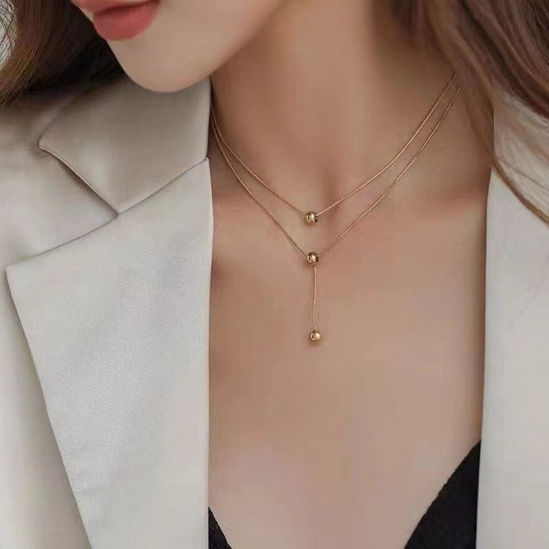 Doppelschicht Ige Runde Perlenkette Weibliche Kreative Sinn Für All-match-quaste Edelstahl-kurzkette