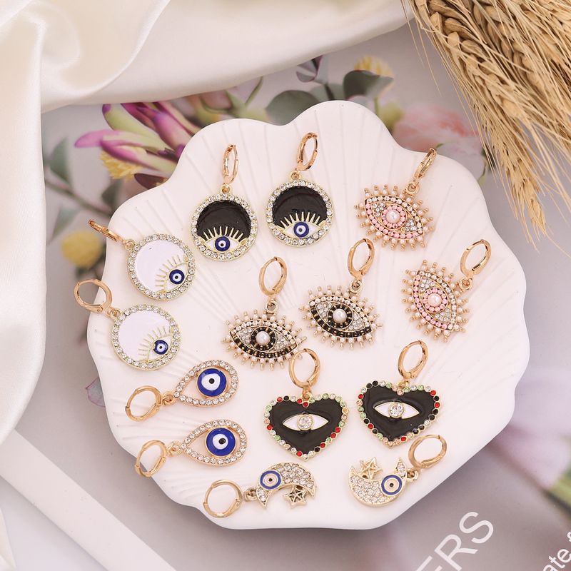 Retro Full Diamond Pearl Eye Earrings Wholesale Nihaojewelry