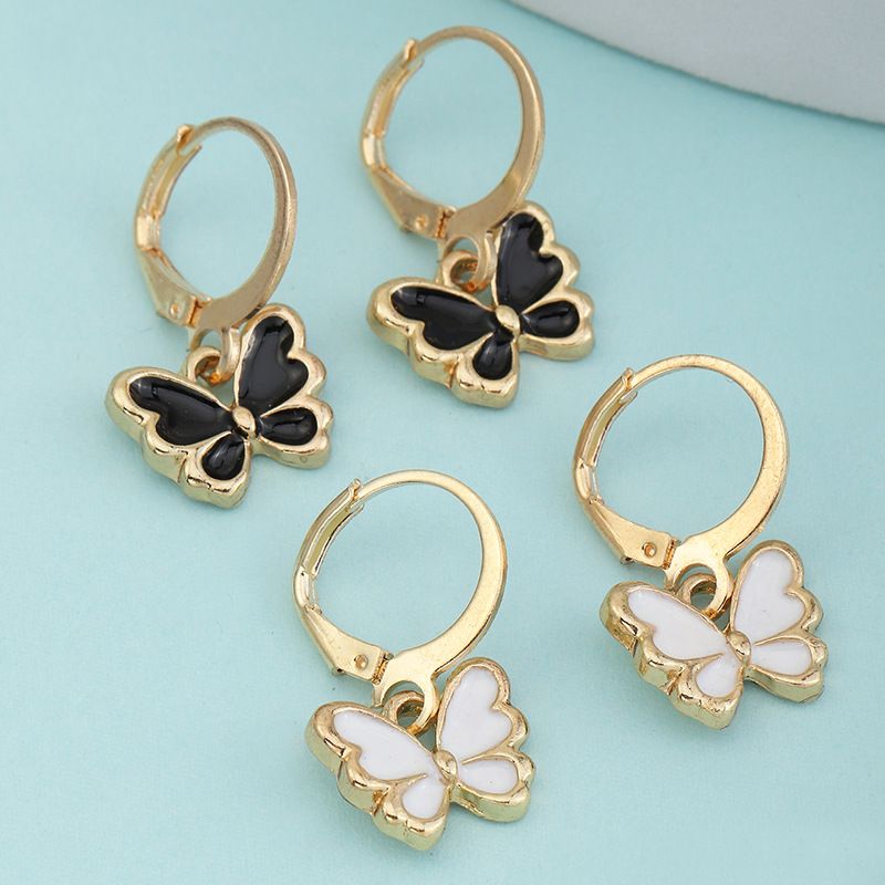 Cross-border Ins Butterfly Girls' Earrings European And American Retro Homemade Alloy Dripping Small Butterfly Ornament