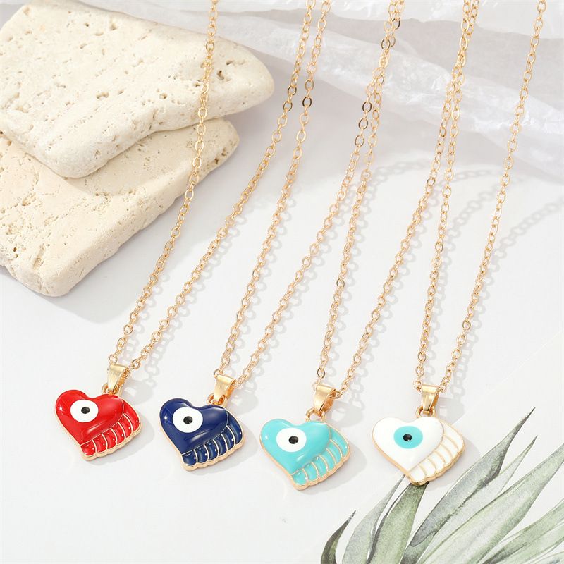 Fashion Alloy Drip Oil Color Eyes Wings Heart Necklace Peach Heart Devil Eye Necklace