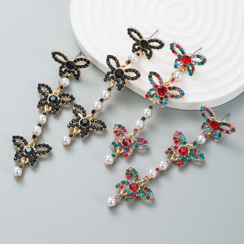 Fashion Rhinestone Butterfly Long Pearl Alloy Earrings Wholesale