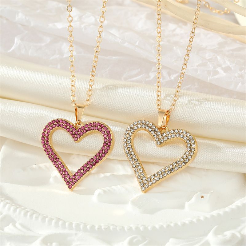 Collar De Corazón Geométrico De Corazón Hueco De Diamantes De Imitación Completo Retro Al Por Mayor