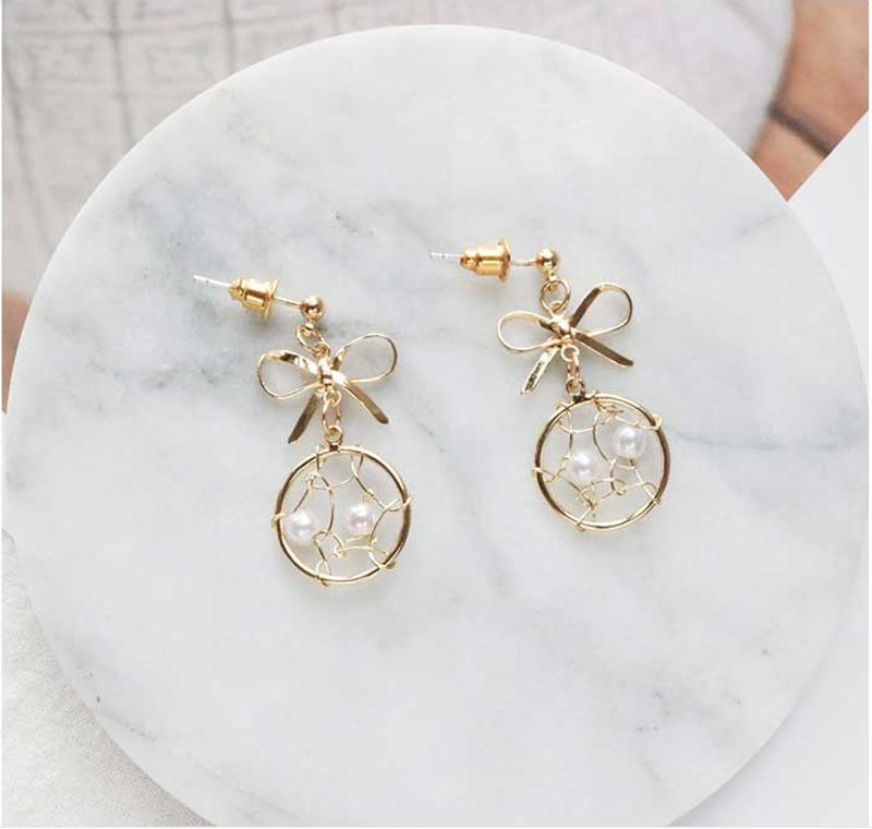 Fashion Geometric Solid Color Hollow Bow Pearl Earrings