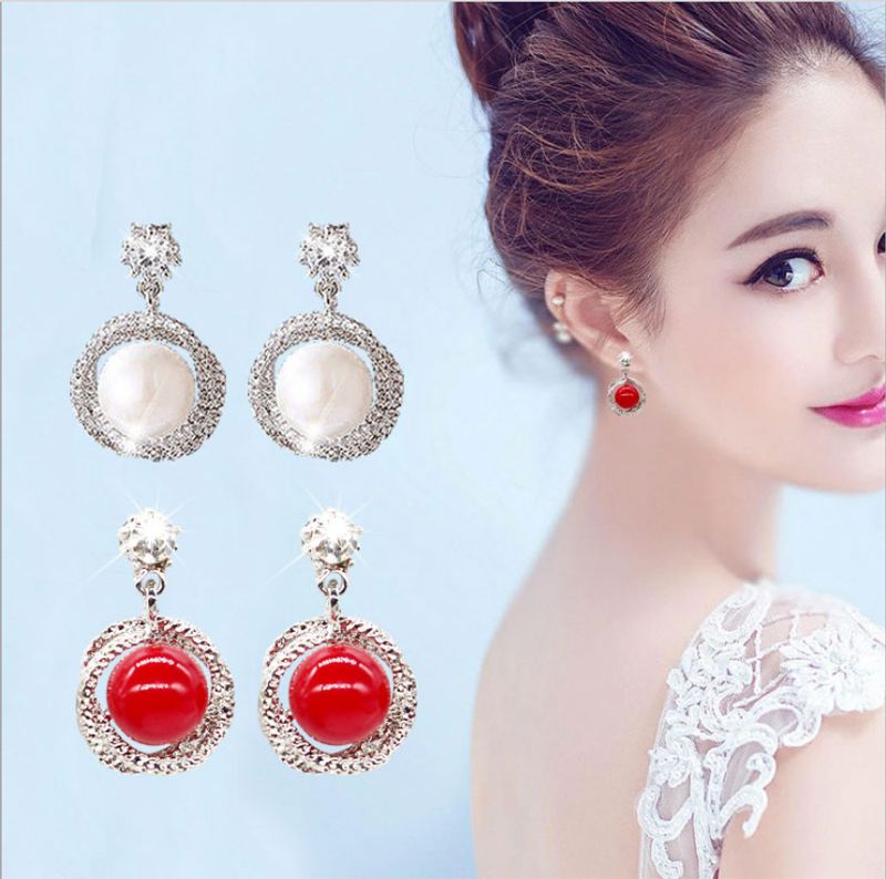 Fashion Hollow Red Pearl Fashion Earrings Wholesale