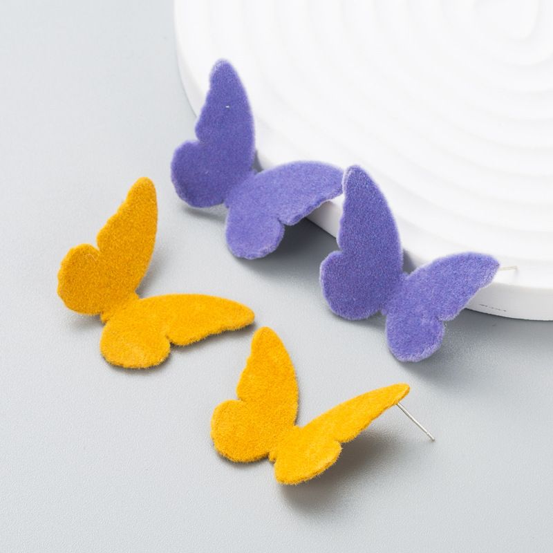 Mode Einfarbig Beflockte Schmetterling Einfache Ohrringe