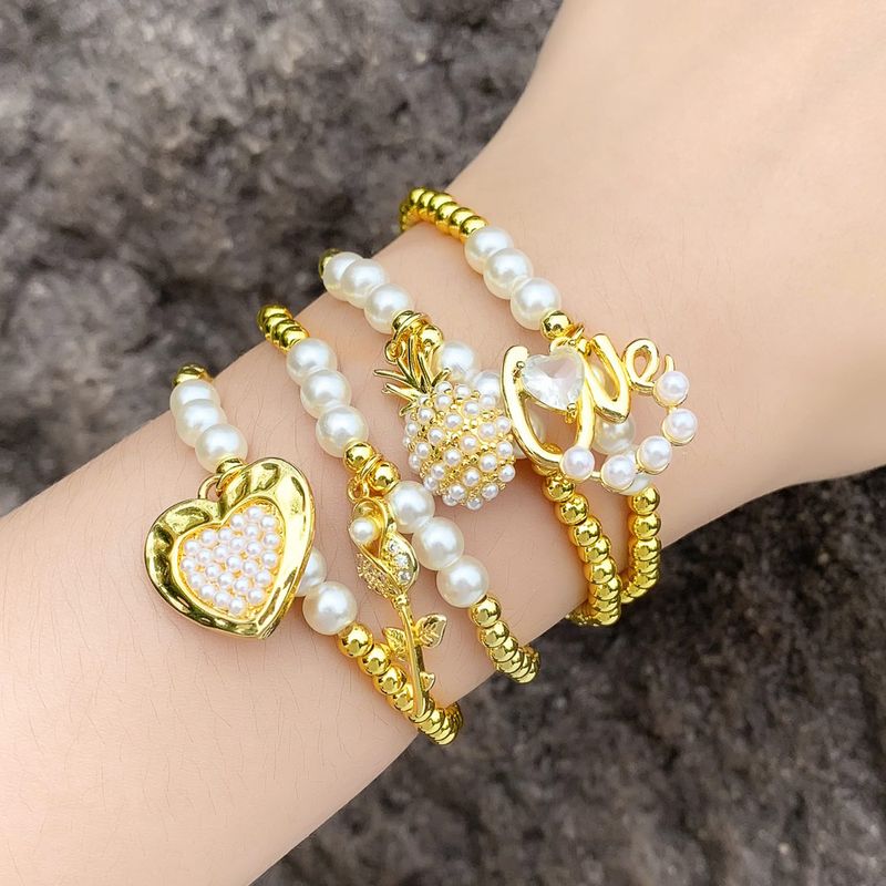 Style Baroque Forme De Cœur Noeud D'arc Clé Le Cuivre Plaqué Or Perles Artificielles Zircon Bracelets 1 Pièce