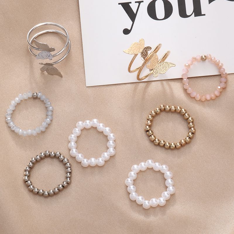 Mode Schmetterling Metall Perlen Künstliche Perlen Frau Ringe 4-teiliges Set