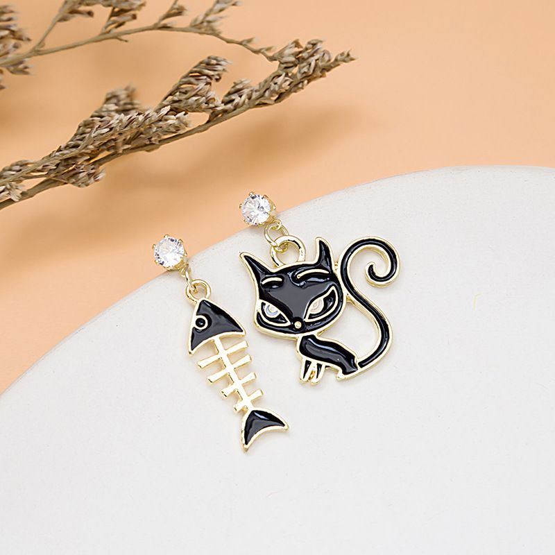 Mode Chat Arête De Poisson Alliage Asymétrique Placage Incruster Strass Femmes Boucles D'oreilles 1 Paire