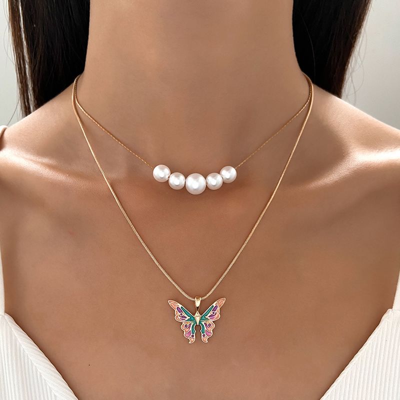 Mode Papillon Alliage Émail Placage Perles Artificielles Femmes Collier En Couches 1 Pièce