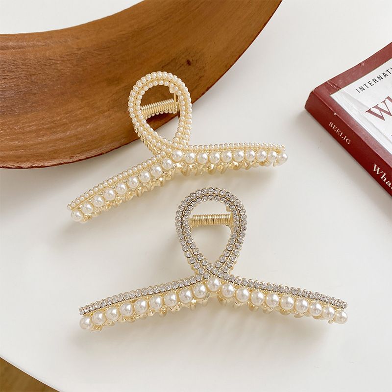 Femmes Luxueux Géométrique Alliage Incruster Perles Artificielles Strass Griffes De Cheveux