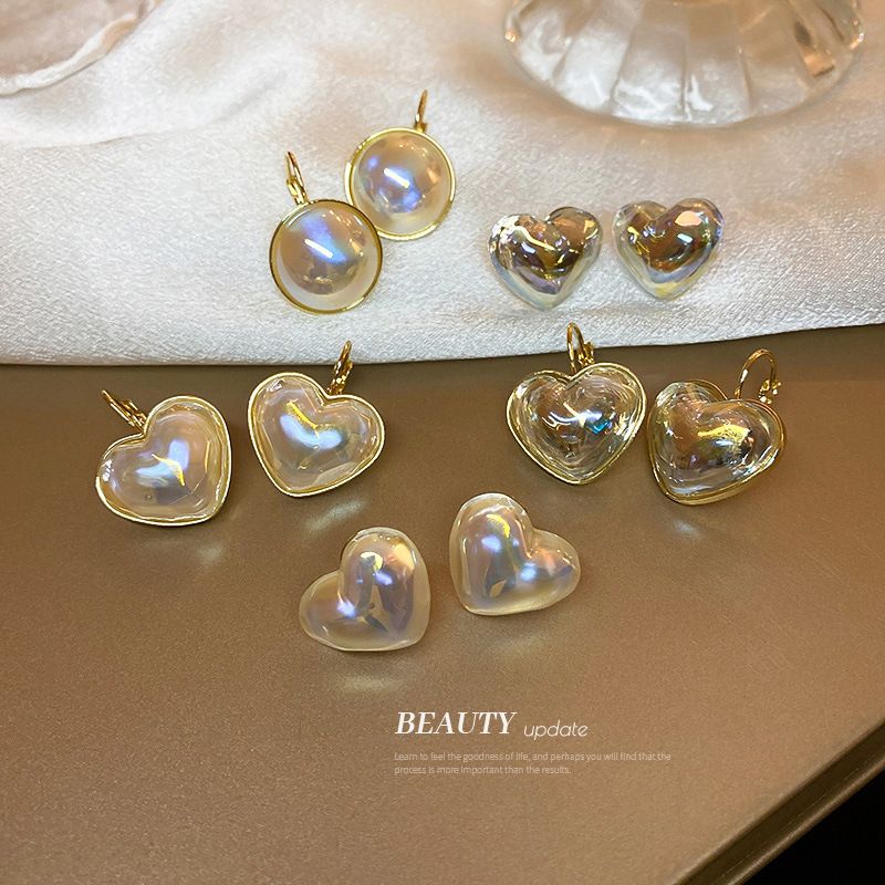 Fashion Pearl Heart Shaped Alloy Earrings Wholesale