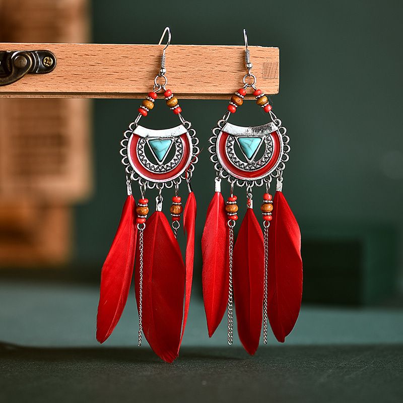 Fashion Fan-shaped Imitation Turquoise Tassel Long Rice Bead Feather Earrings Wholesale