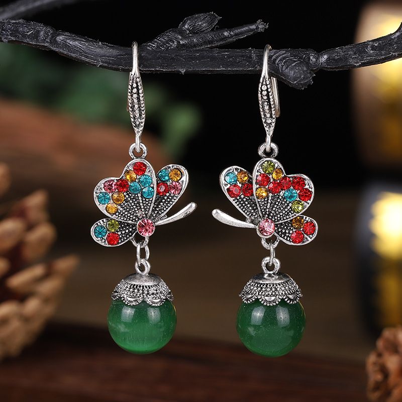 Fashion New Butterfly Opal Diamond Alloy Earrings Wholesale