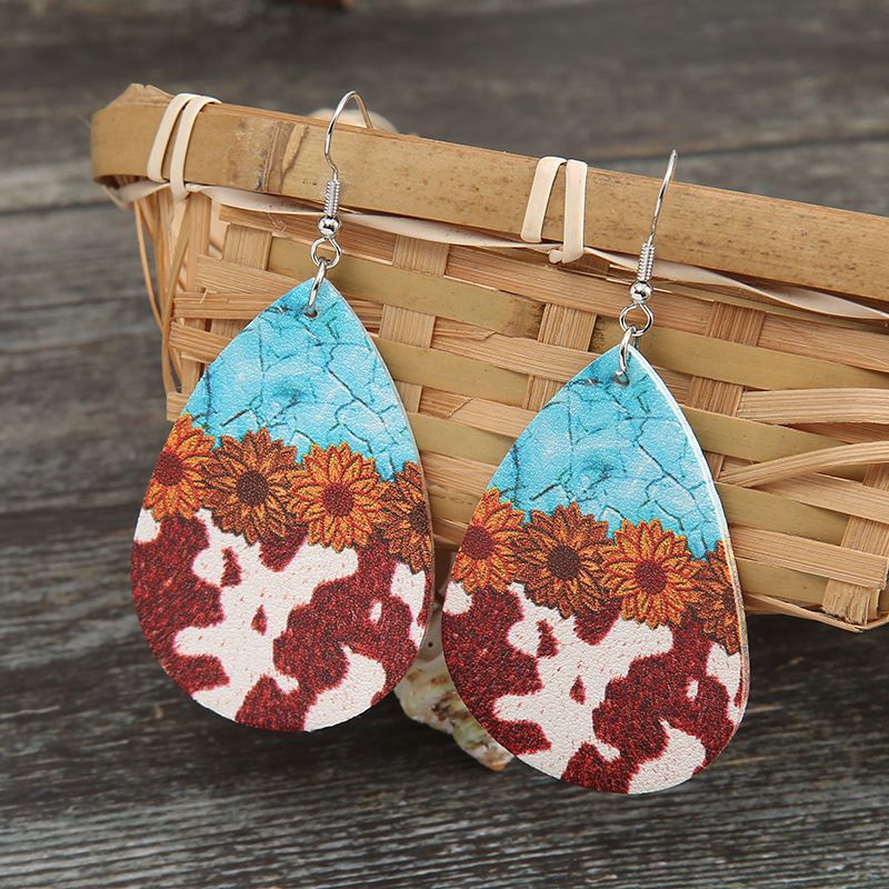 Fashion Turquoise Cow Grain Sunflower Pattern Leather Earrings