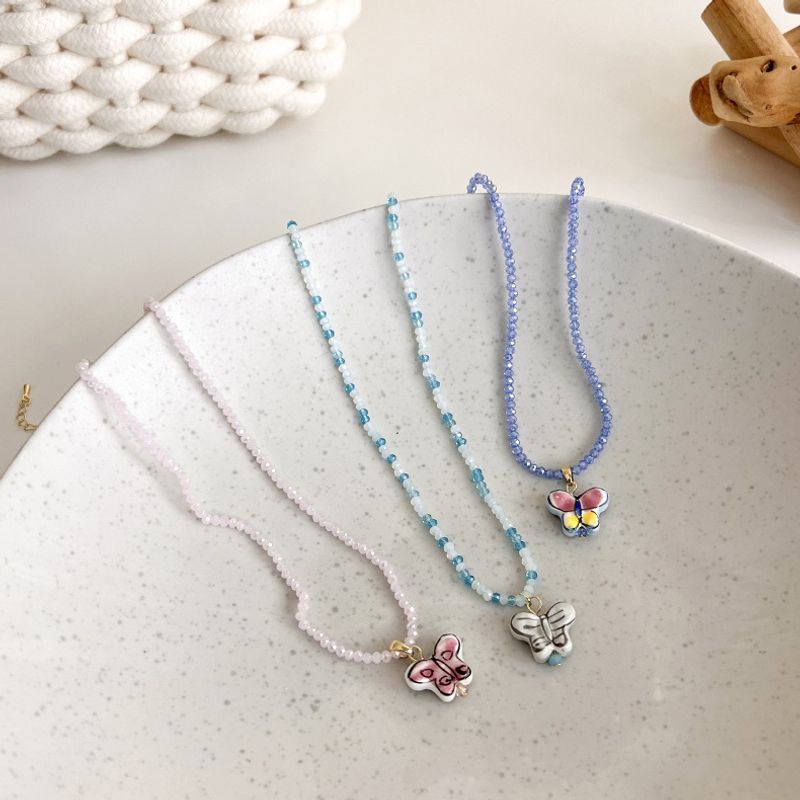 Modefarbe Keramik Perlen Schmetterling Kontrastfarbe Spleißen Kristall Perlenkette